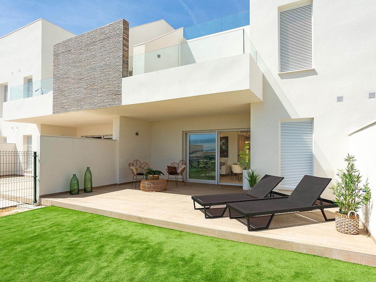 Luxury maisonettes at La Finca Golf Resort in Costa Blanca South with pool and garden views.