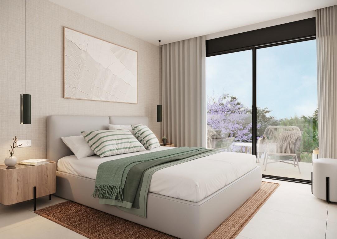 Townhouses overlooking Alicante Golf with modern designs and nearby beach access.