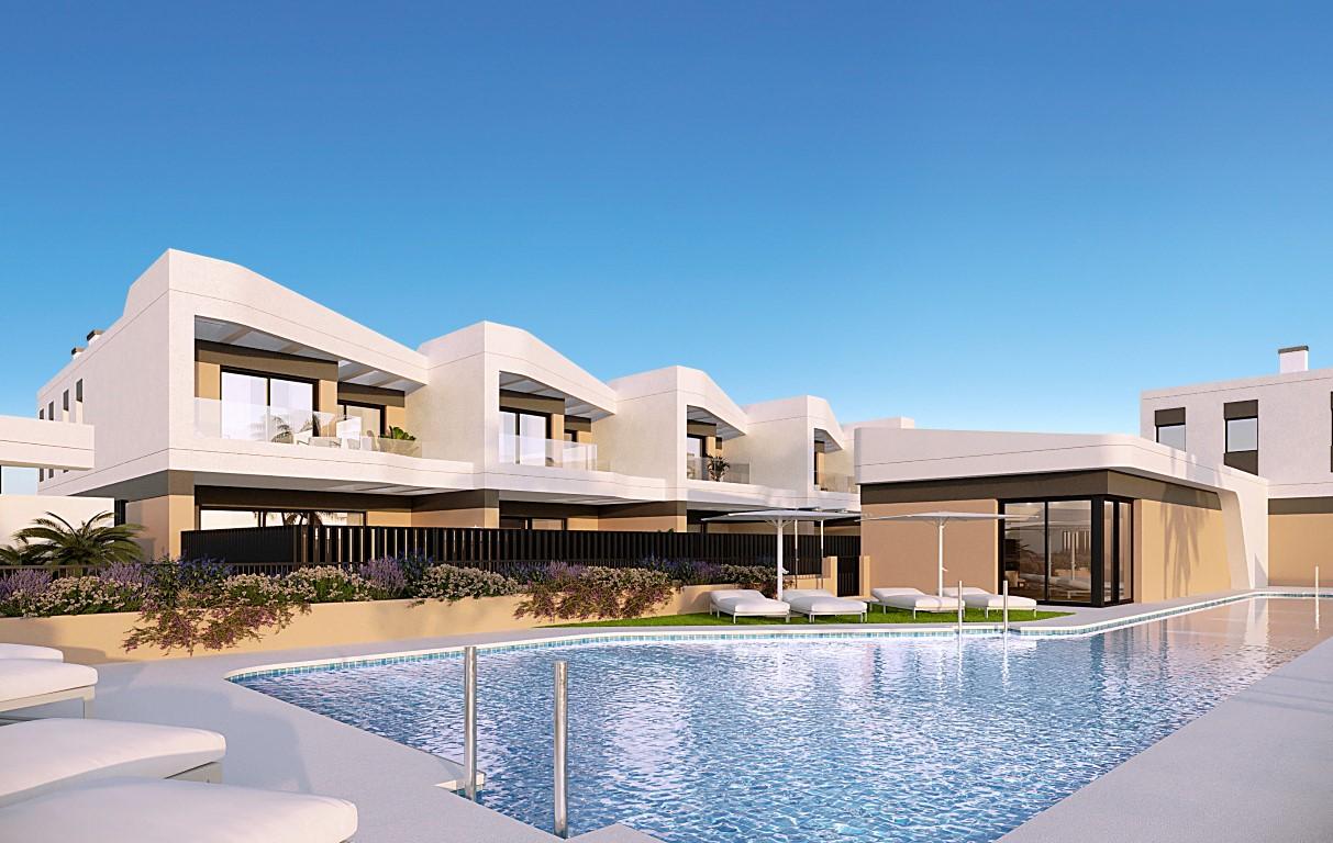 Townhouses overlooking Alicante Golf with modern designs and nearby beach access.